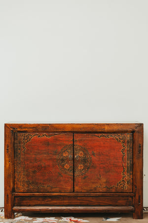 Wooden Sideboard with Reddish Hue