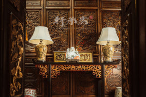 An elegant intricately carved everted flange console table