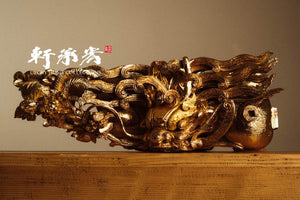elaborately carved corbel dragon carp