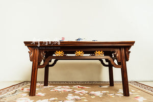 An elegant Ming-style mahogany coffee table