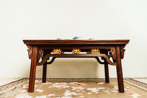 An elegant Ming-style mahogany coffee table