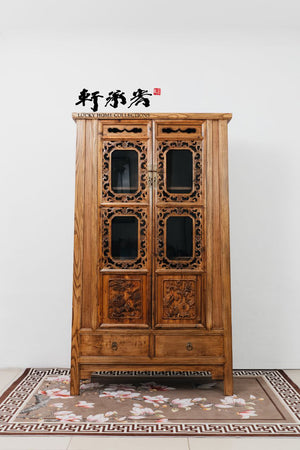 display cabinet with intricate carving in foliage scrolls motifs
