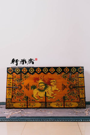 hand drawn trunk table in motifs of Tibetan snow lions